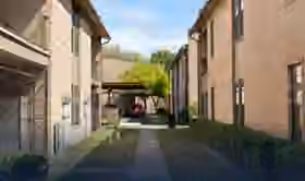 Existing Royal Oaks apartment buildings and courtyard.