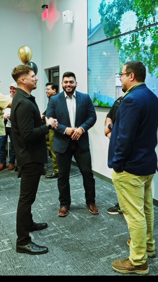 Guests and the Capital Advisors team talking together at the previous showcase